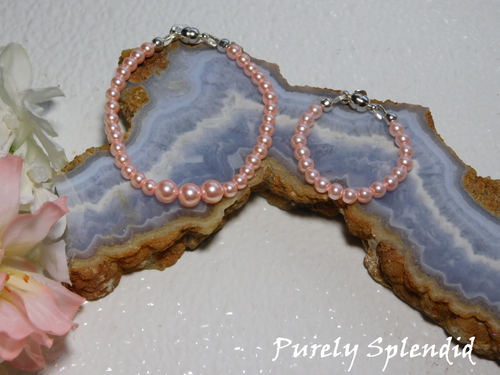 Graduated Pink Pearl Necklace with three large center pearls and a Pink Pearl Bracelet for 18 inch dolls
