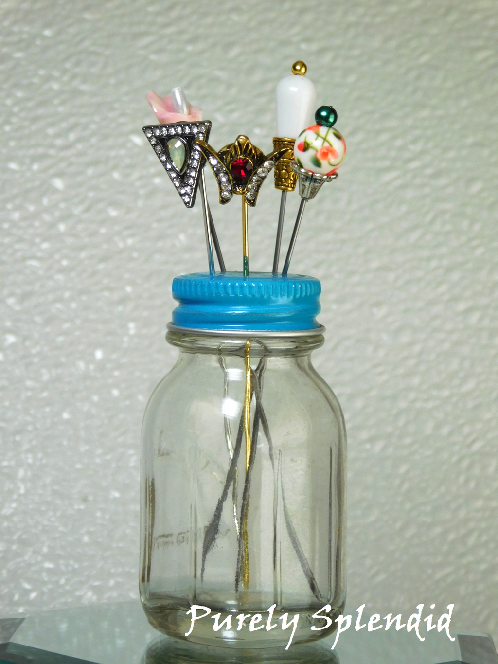 hat pins in a holder