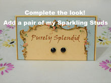 Load image into Gallery viewer, Complete the look! Add a pair of my Sparkling Jet Black Studs for dolls who wear 2mm studs
