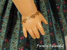 Load image into Gallery viewer, 18 inch doll shown wearing a Lacy Heart Bracelet

