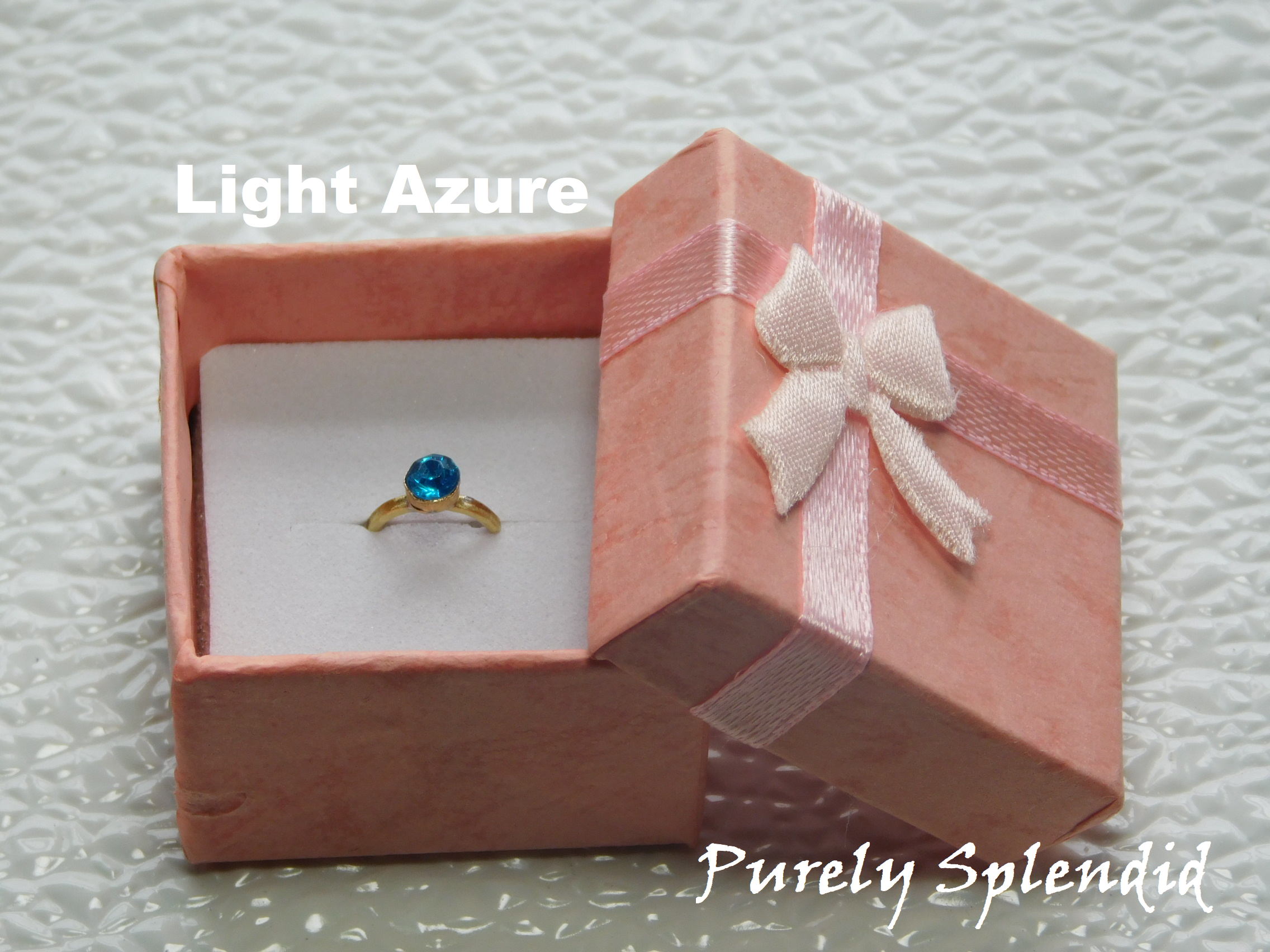 Light Azure crystal on a gold band