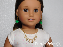 Load image into Gallery viewer, gold charm necklace worn by an 18 inch doll with the word lucky spelled out and a gold four leaf clover charm
