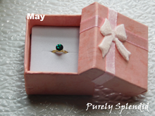 Load image into Gallery viewer, May Birthstone Ring for 18 inch dolls - emerald colored crystal on a gold band
