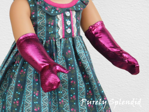 18 inch doll shown wearing a pair of Magenta Shimmer Gloves