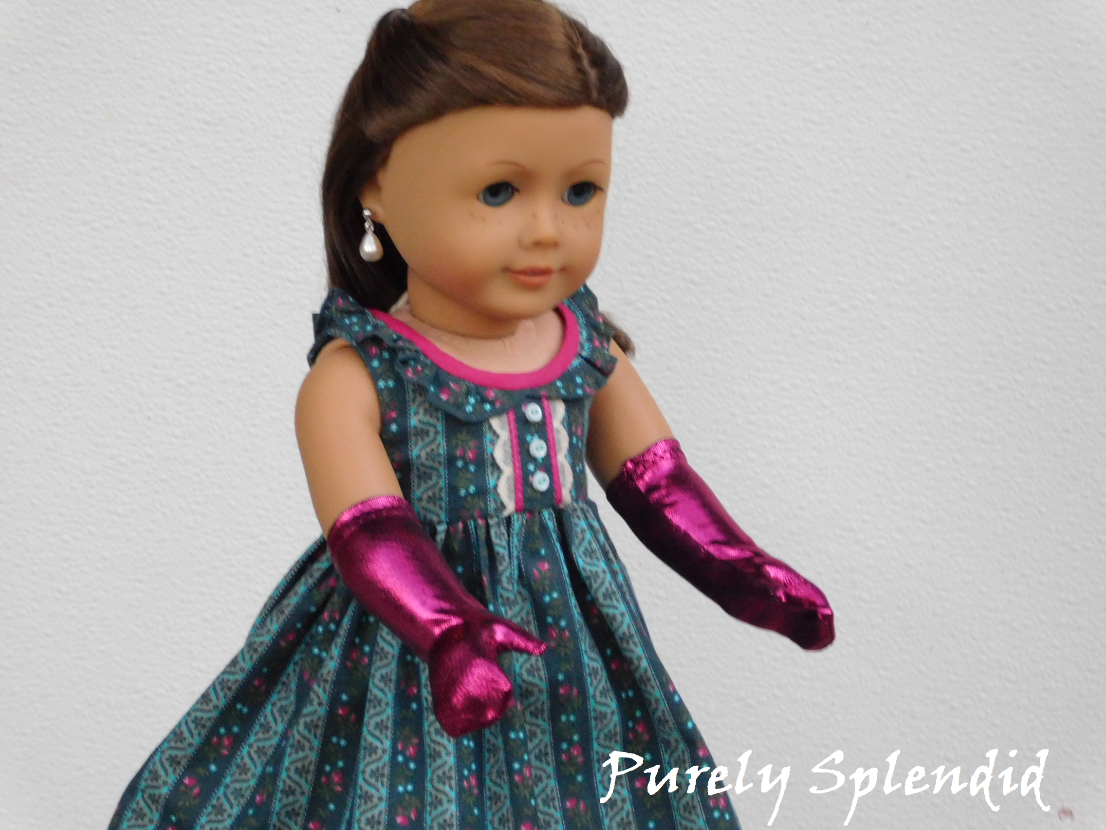 18 inch doll shown wearing a pair of Magenta Shimmer Gloves