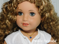 18 inch doll shown wearing a Blue Mini Heart Choker necklace - small blue heart on a twisted gold chain