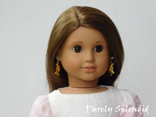 18 inch doll shown wearing a pair of Moon and Star Earring Dangles 