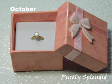 Load image into Gallery viewer, October Birthstone Ring for 18 inch dolls  - opal like crystal on a gold band
