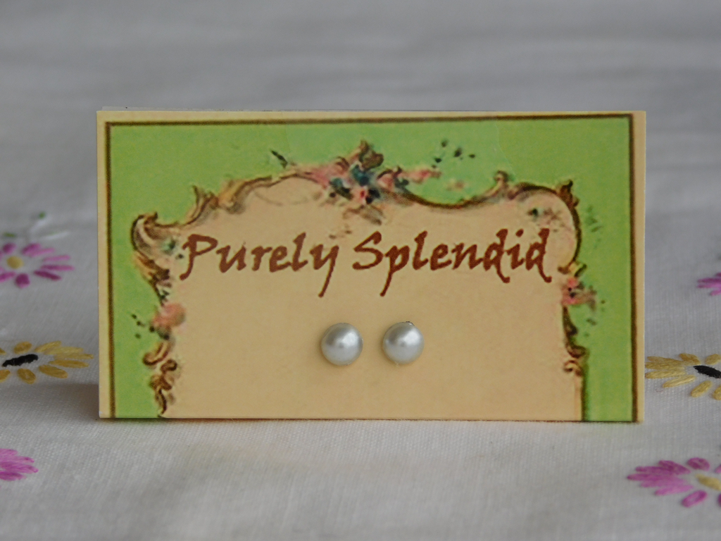 A pair of Pearl 2mm Studs for dolls