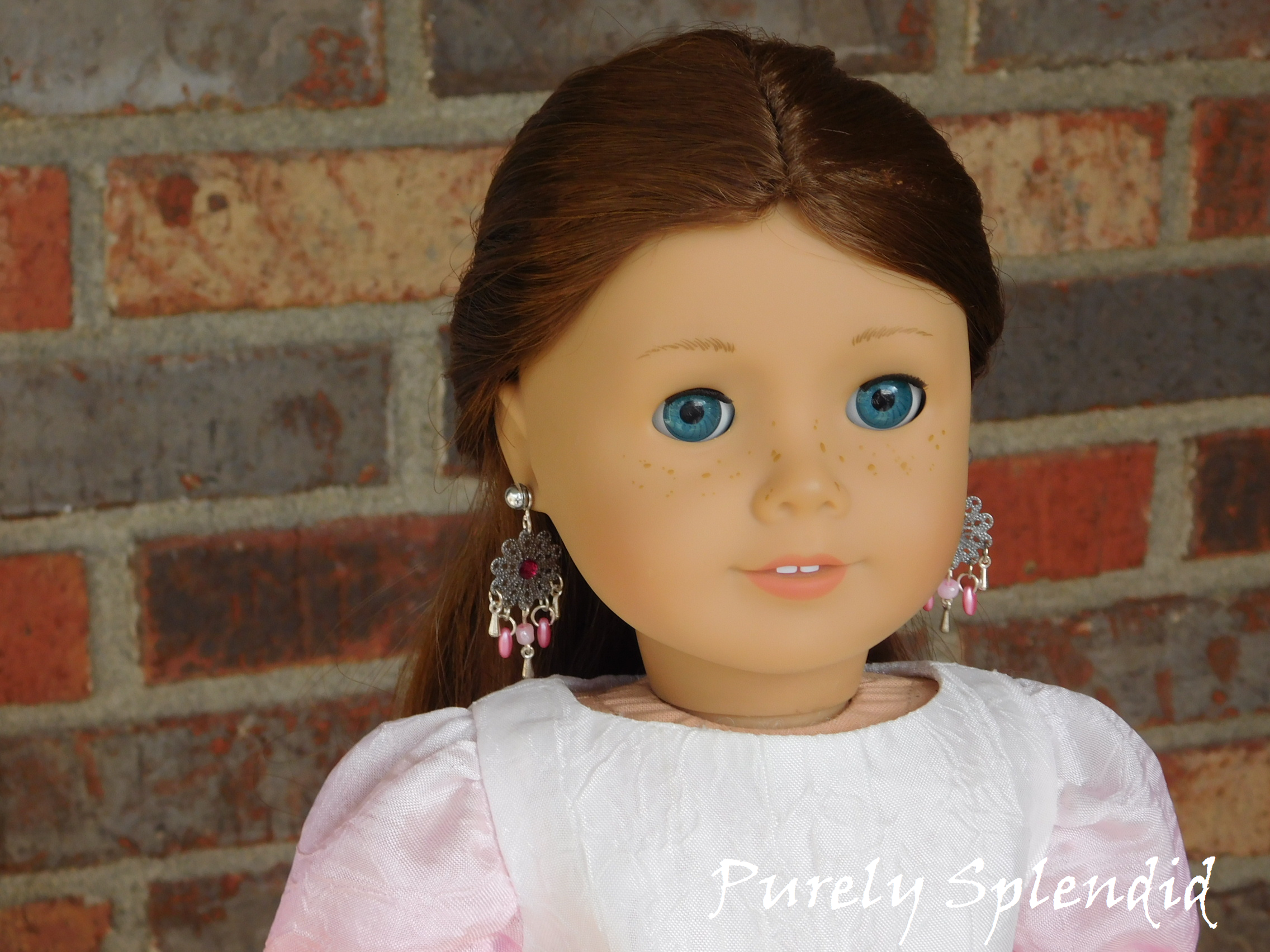 18 inch doll show wearing a pair of Pink Chandelier Earring Dangles 