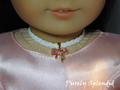 Lacy White Choker with sparkling pink bow worn by an 18 inch doll