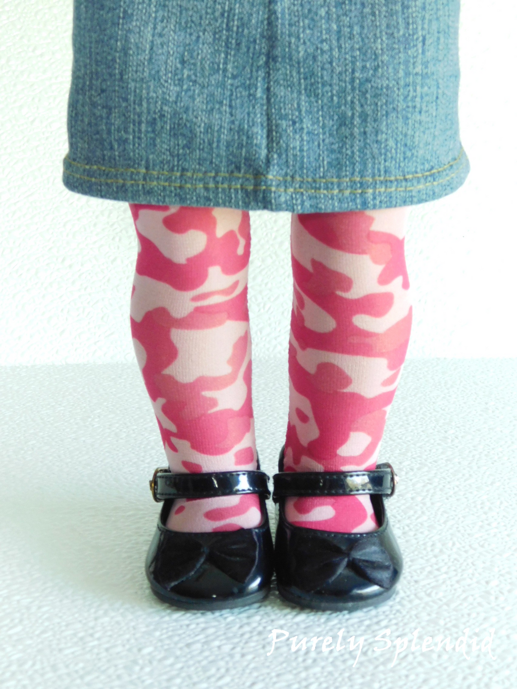 18 inch doll wearing pink camouflage tights - stretchy pink camo leggings for dolls 