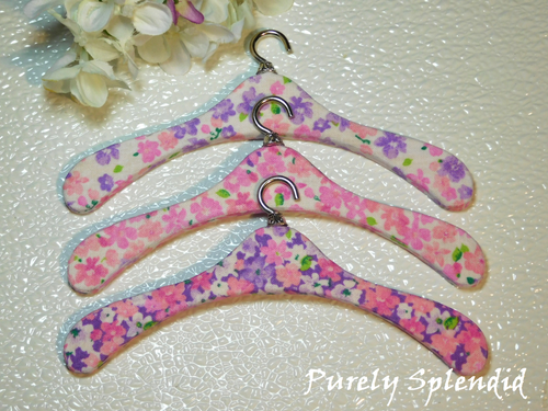 Pink and purple floral fabric-covered wooden clothes hangers for 18 inch girl dolls, set of 3, American made | Purely Splendid
