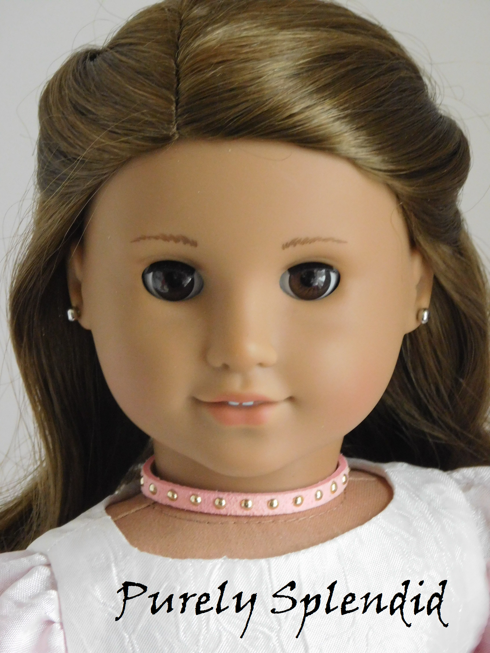 18 inch doll shown wearing a Pink Choker with Gold Studs