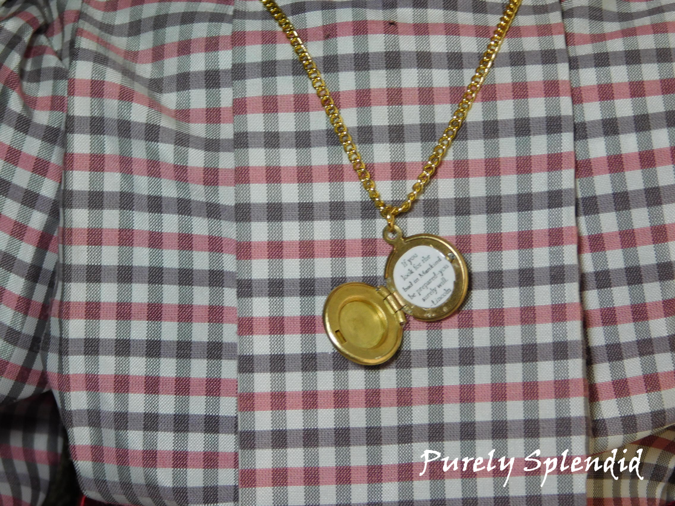 Open Round Locket with Pollyanna saying inside