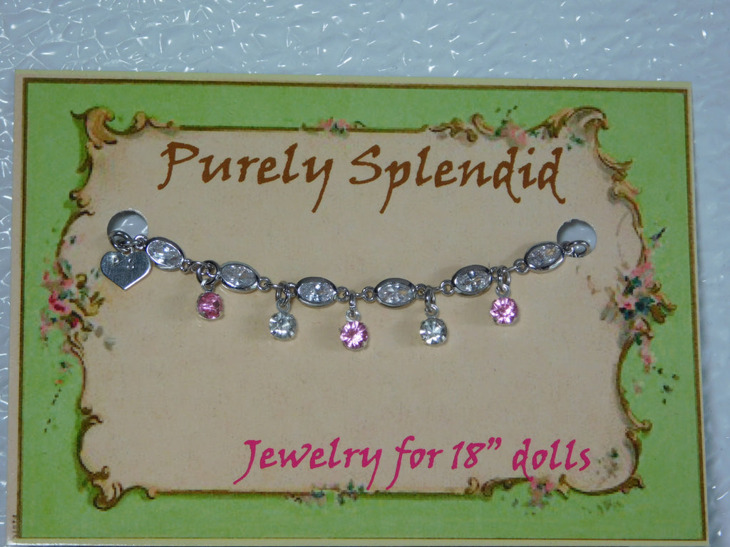 crystal bracelet with alternating light pink and clear crystals dangling from the bracelet