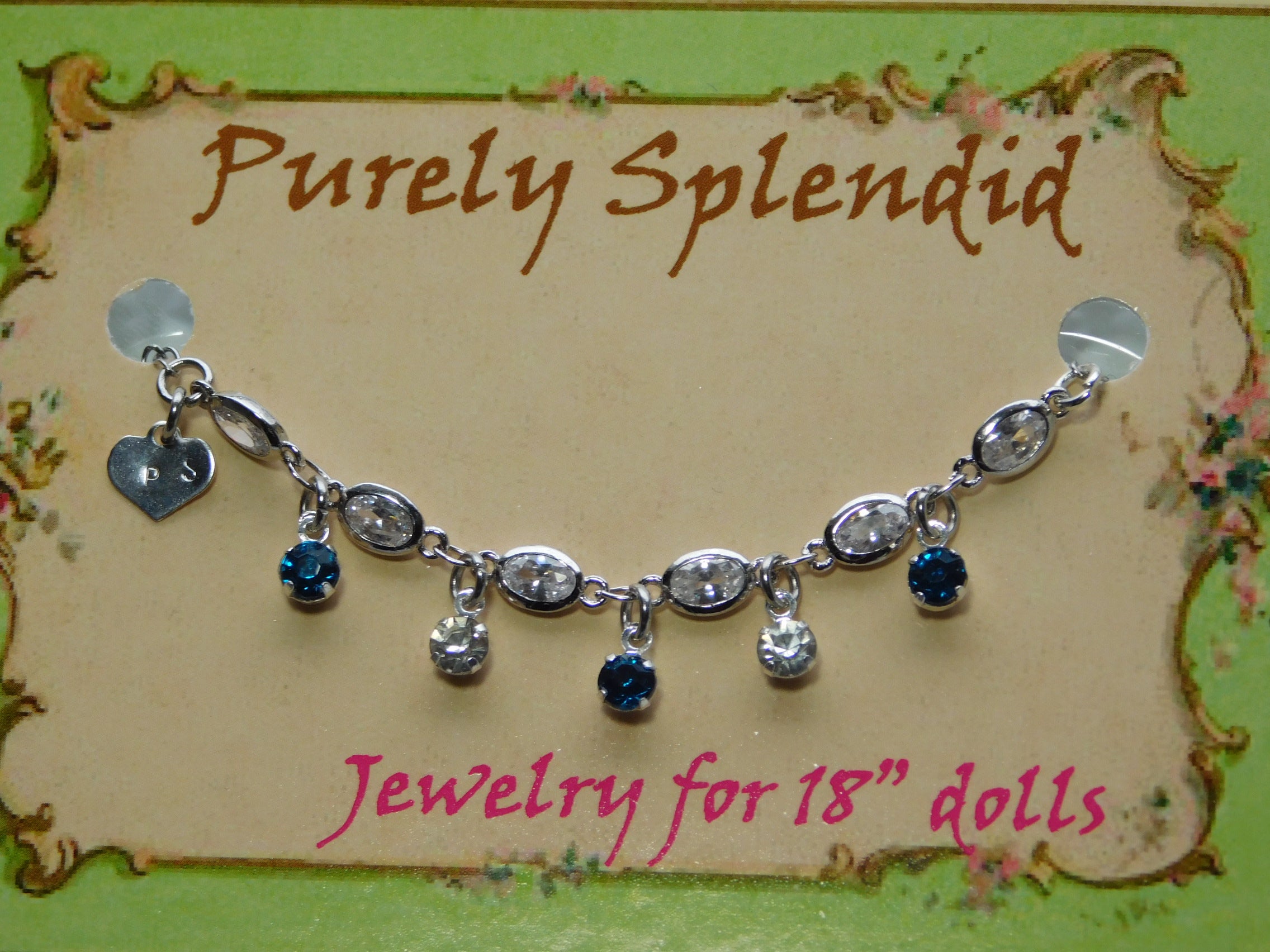 crystal bracelet with alternating azure and clear crystals dangling