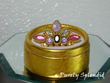 Load image into Gallery viewer, beautiful jeweled mini crown with pink, purple, opal and aurora borealis stones. shown in a gold gift box
