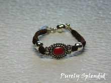 Load image into Gallery viewer, Brown suede bracelet with silver and red focal point
