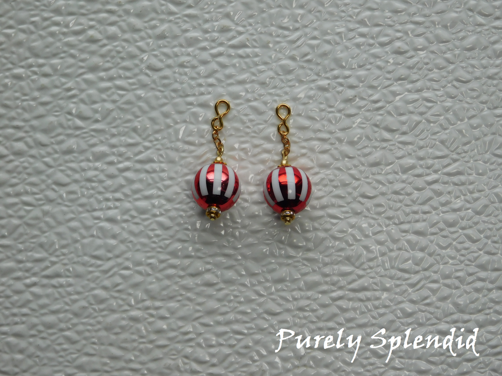 to use with 2mm stud earrings have a loop for the stud to fit through
