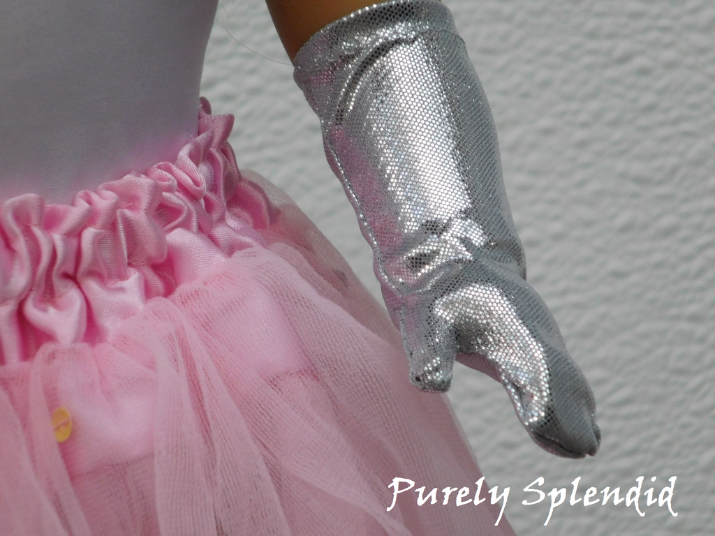 Left hand of an 18 inch doll wearing Silver Shimmer Gloves