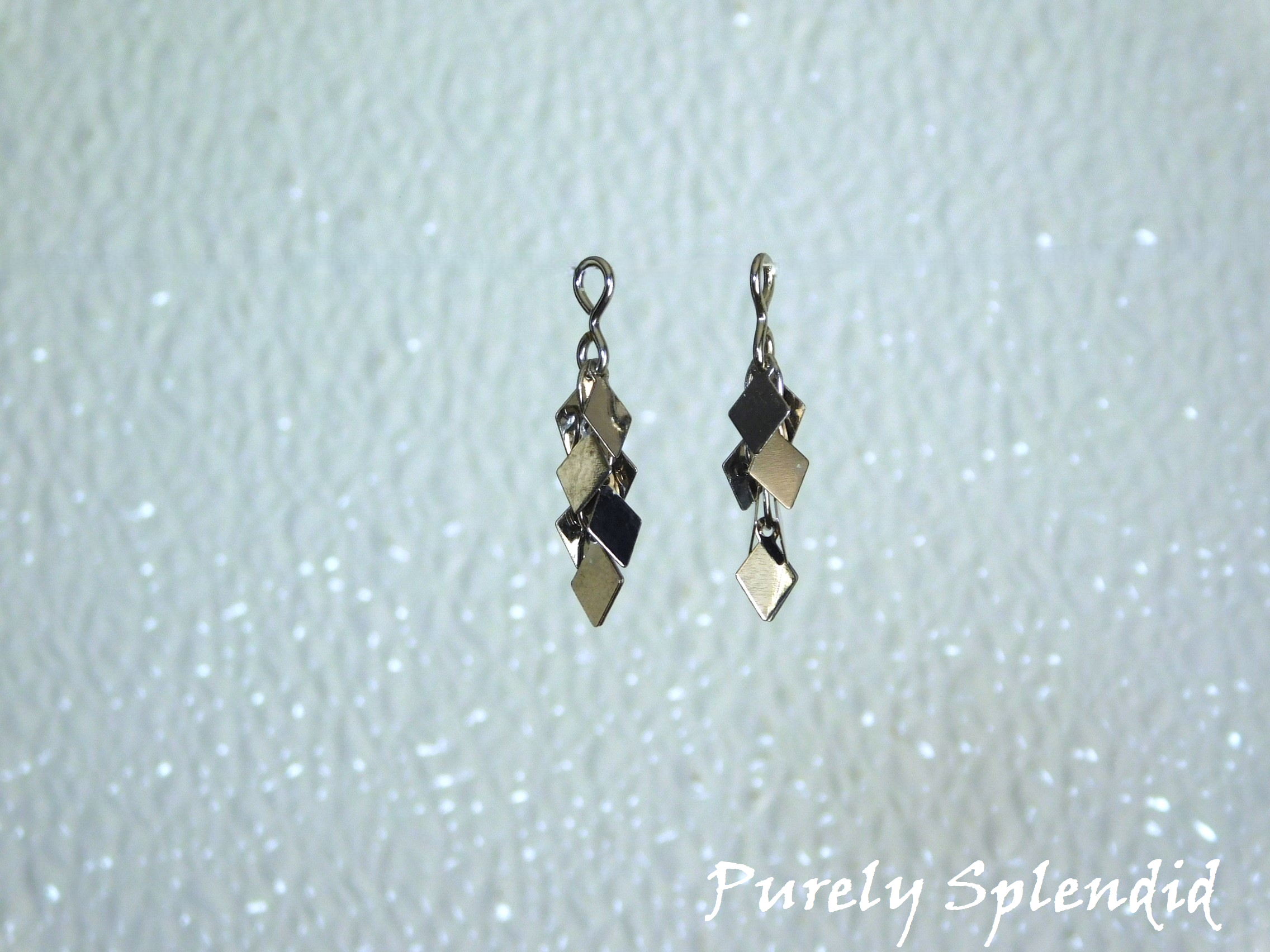silver diamond shapes cascading 