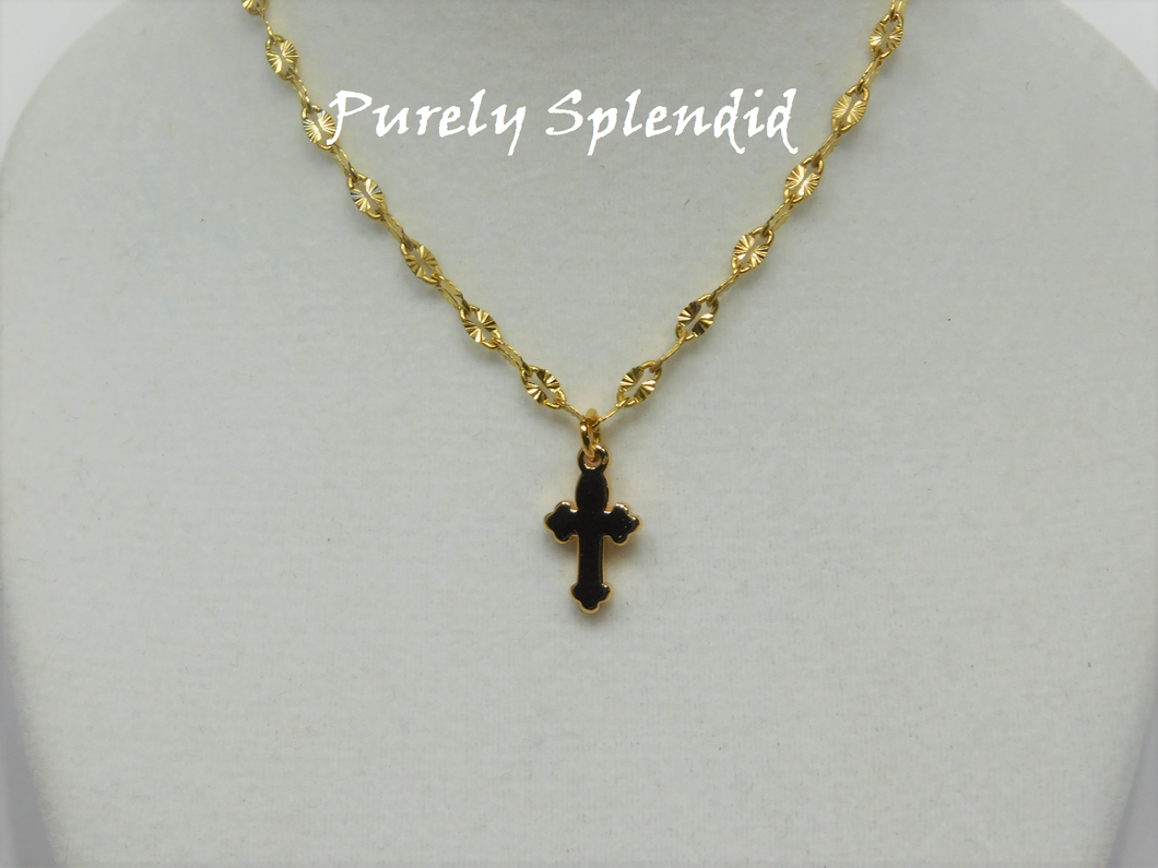 A Simple Gold Cross on a decorative gold chain 