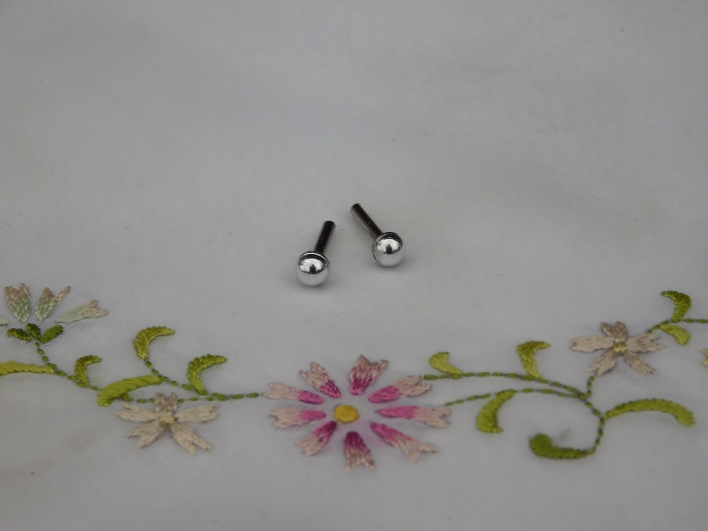 Add a pair of Small Classic Silver Studs for dolls who wear 2mm studs