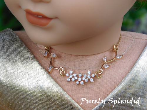 18 inch doll shown wearing the Sparkling Flower and Vine Necklace