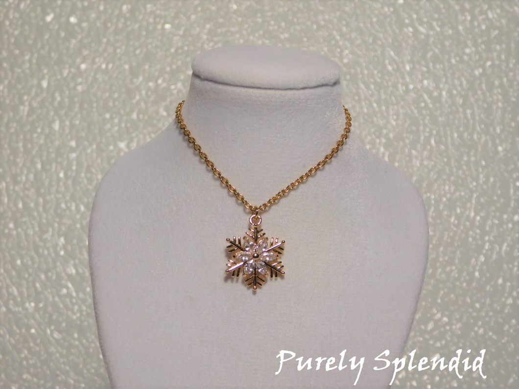 Beautiful Cubic Zirconia crystals on a Gold Snowflake