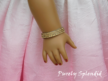 Load image into Gallery viewer, Three rows of sparkling gold rhinestones make up this Sparkling Gold Rhinestone Bracelet
