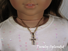 Load image into Gallery viewer, Sparkling Gold Cross Necklace shown worn by an 18 inch doll
