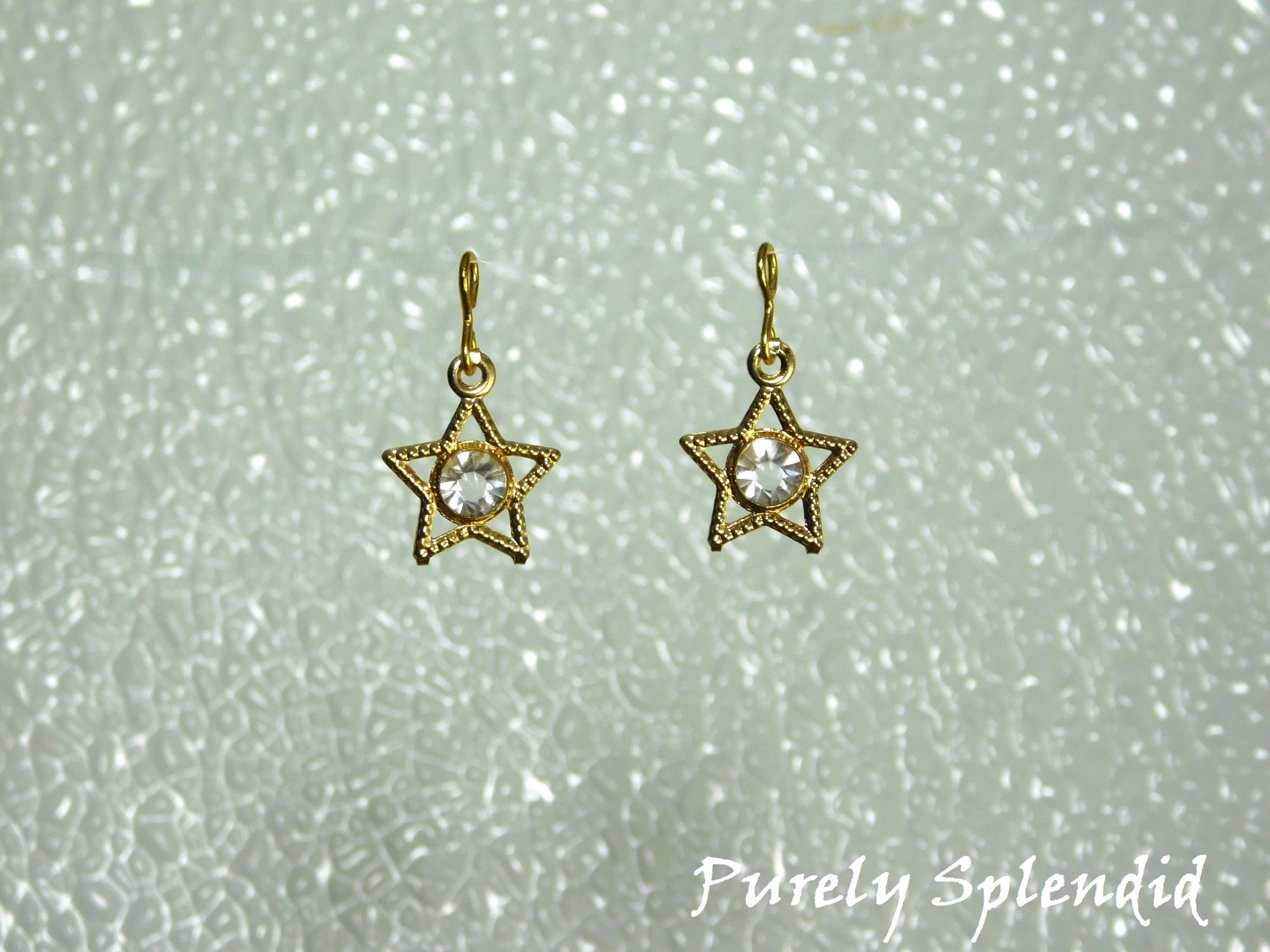 "to use with 2mm studs" Sparkling Gold Star Earrings - gold open stars with a large sparkling center stone