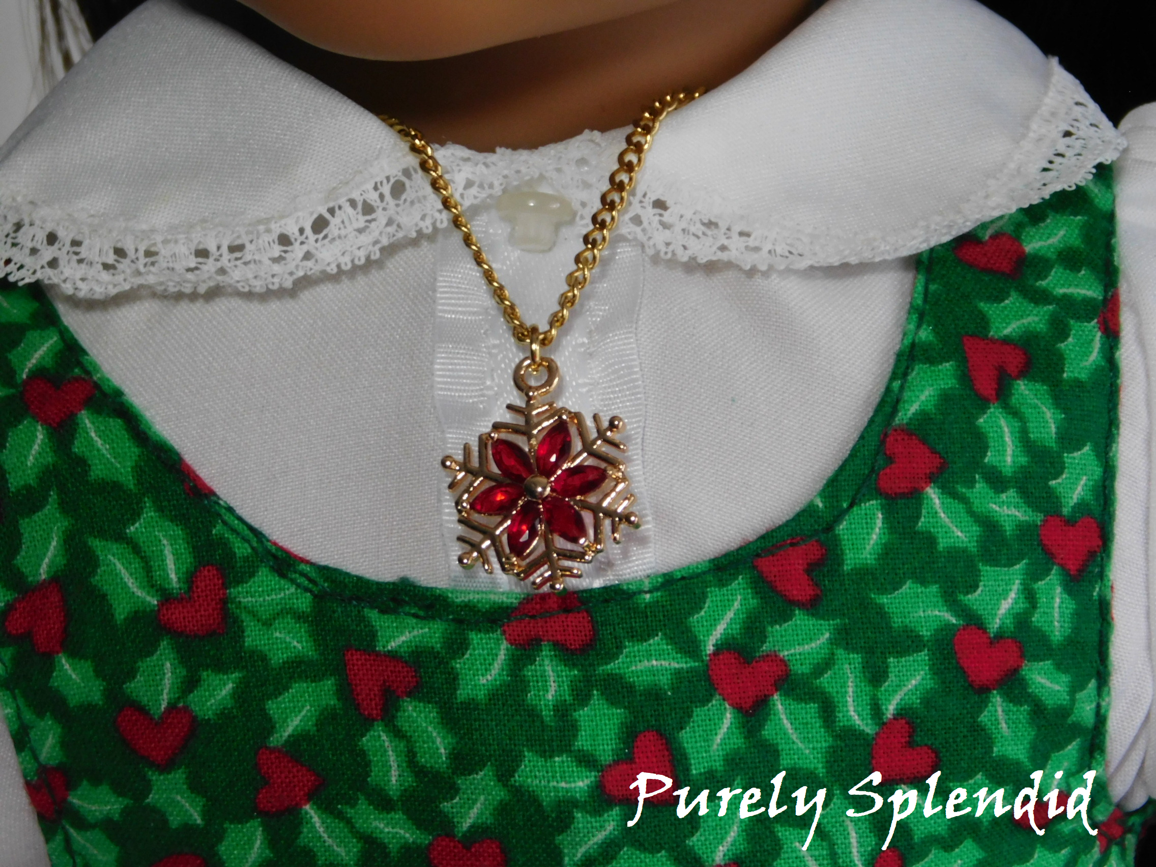 Gold snowflake with sparkling red flower center
