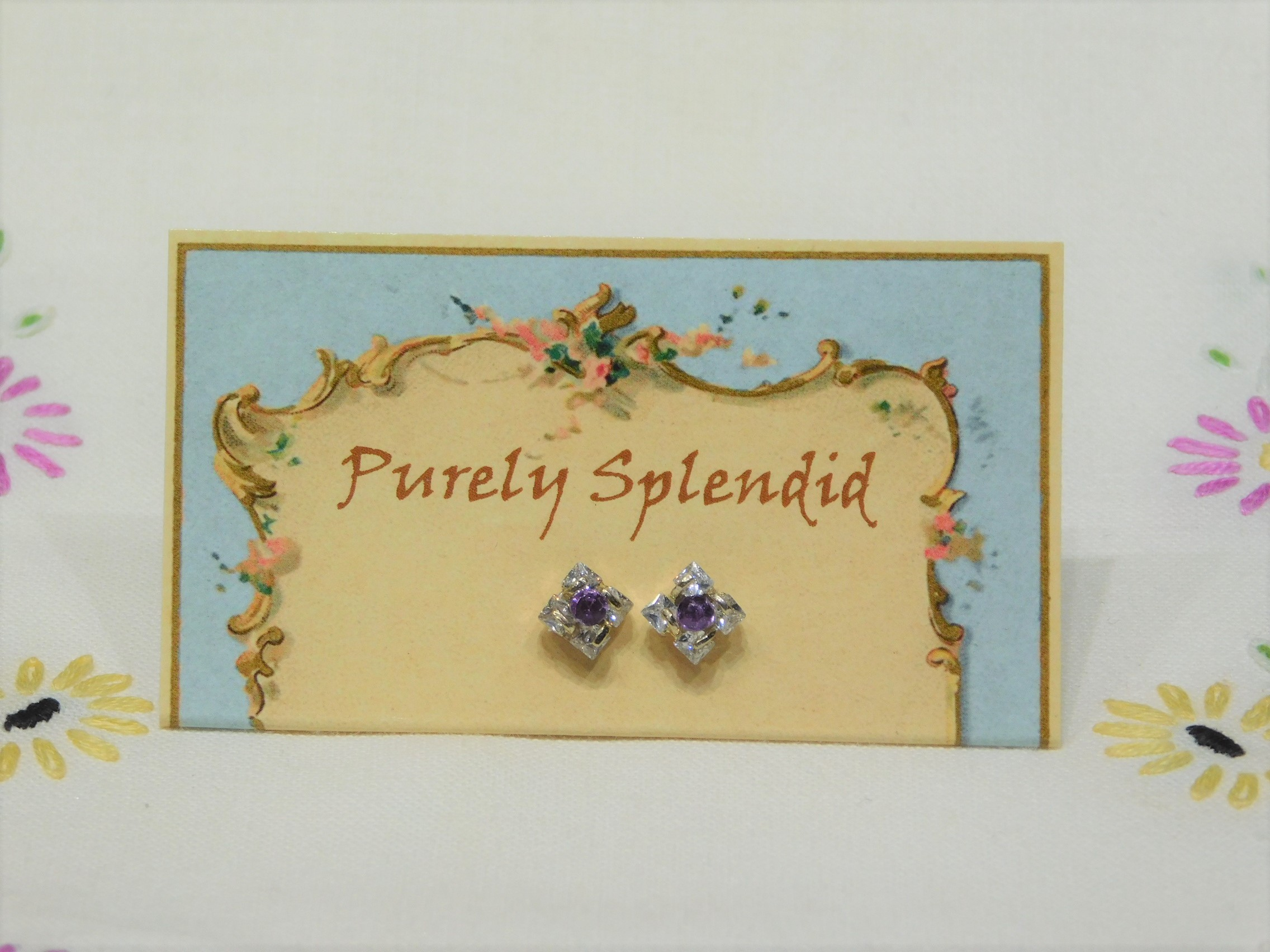 sparkling square studs with purple center crystals