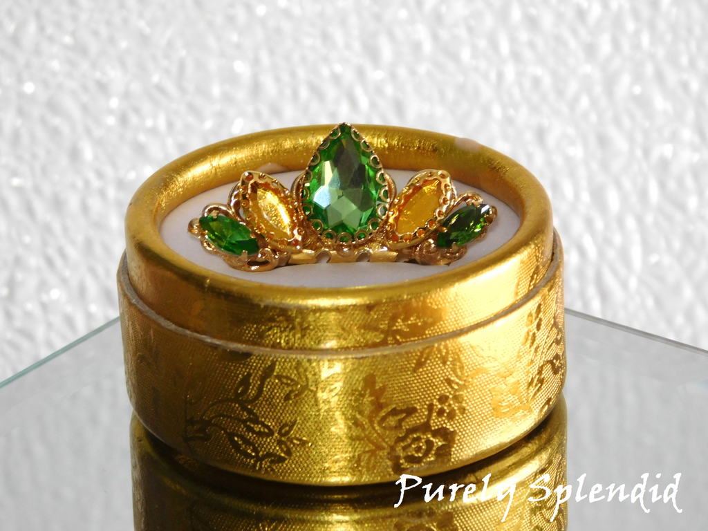 Tiana Crown of Peridot and Gold crystals shown in a gold box