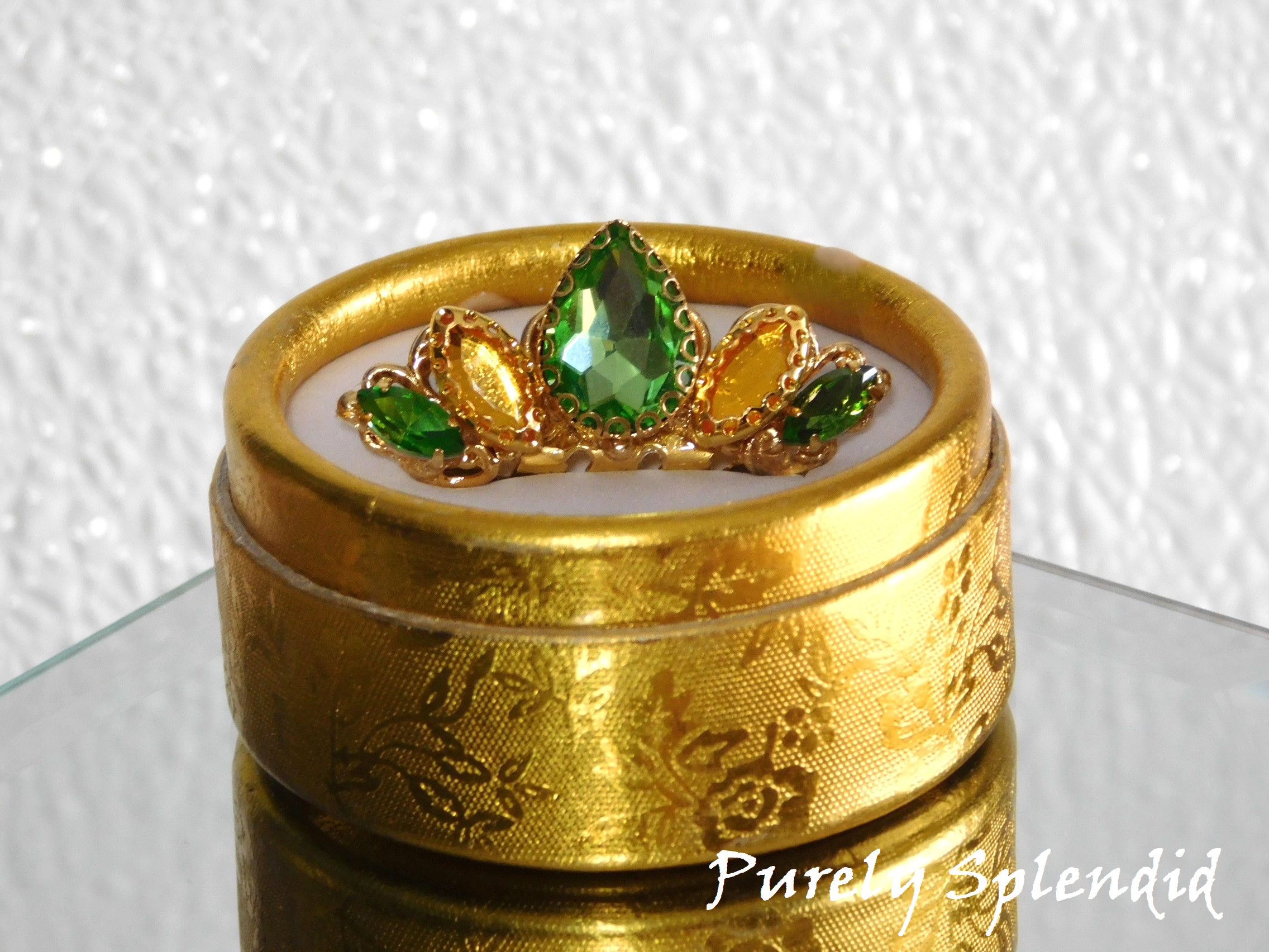 Tiana Crown of Peridot and Gold crystals shown in a gold box