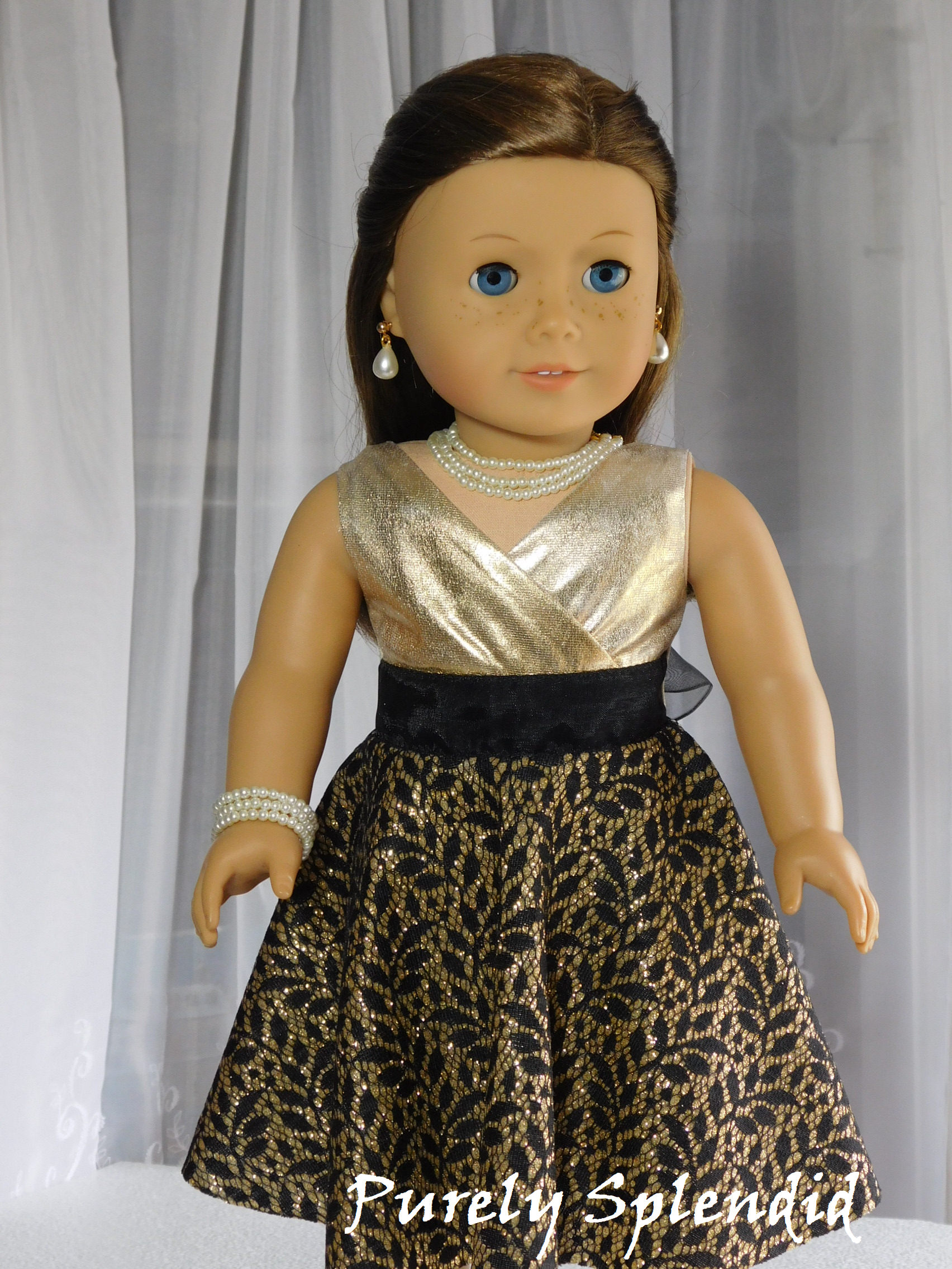 18 inch doll shown wearing a Triple Strand Pearl Bracelet and Triple Strand Pearl Necklace with Pearl Drop Earrings