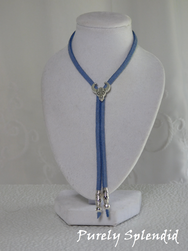 Western Bolo in blue with silver steer head slider and silver tipped ends