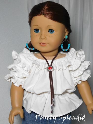 18 inch doll shown wearing a brown Western Bolo which has a silver tips and a red slider 