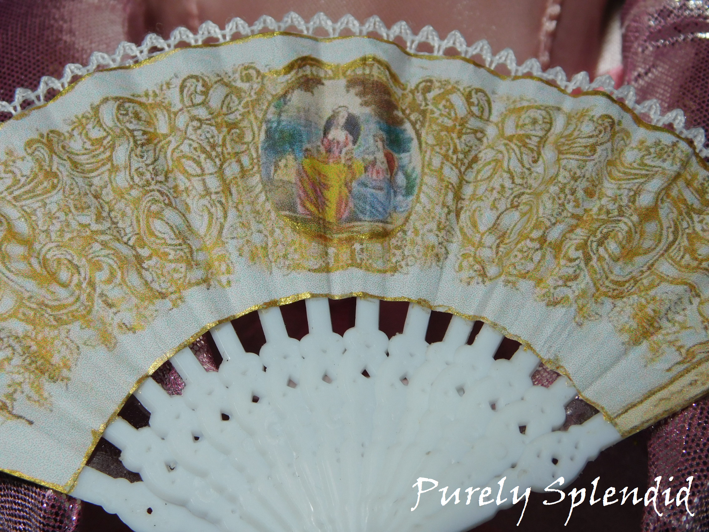 picture of two Victorian ladies with gold scroll work surrounding them