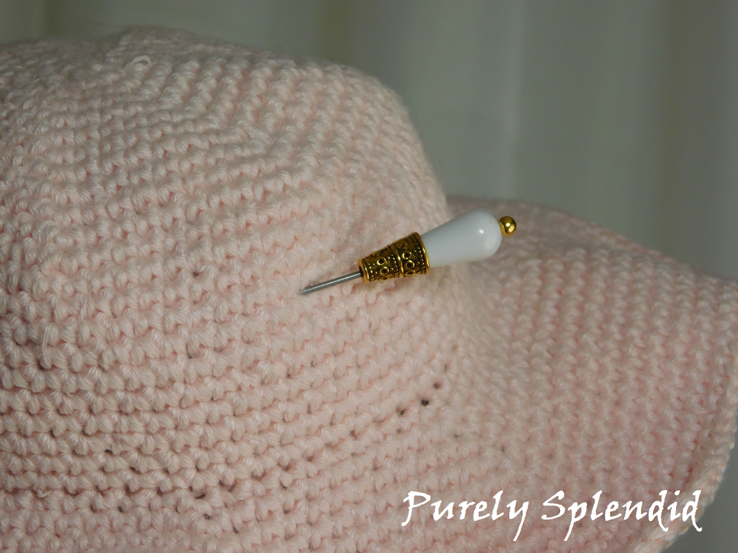 white and gold hat pin for dolls