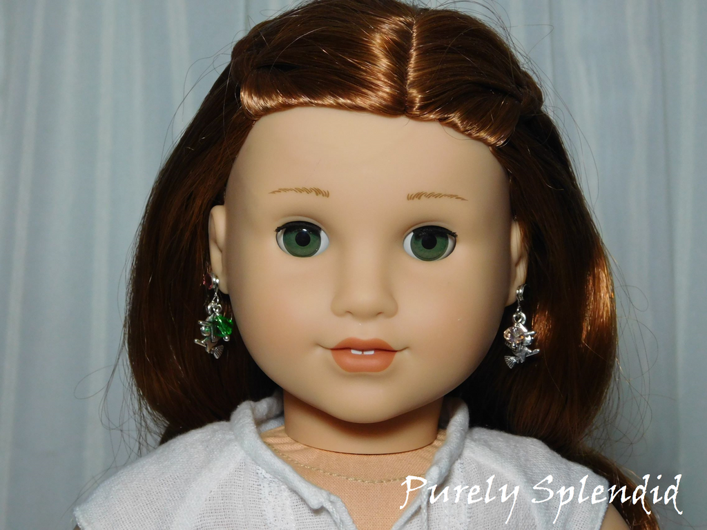 18 inch doll shown wearing a pair of Witch Earrings