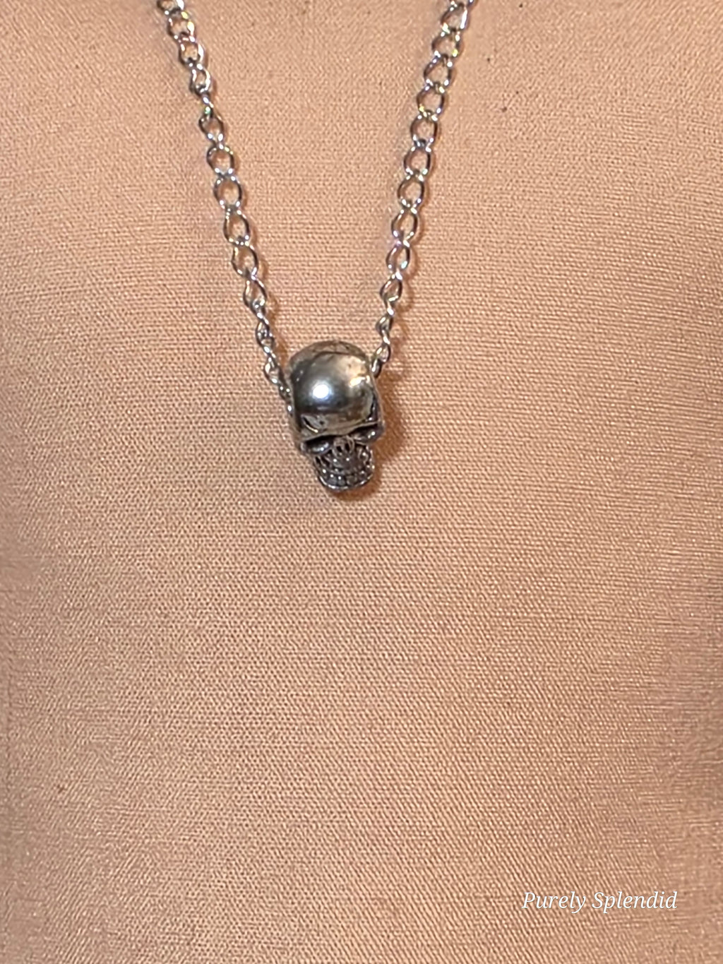 Close-up of silver skull pendant on chain necklace for 18 inch girl or boy doll, American made | Purely Splendid
