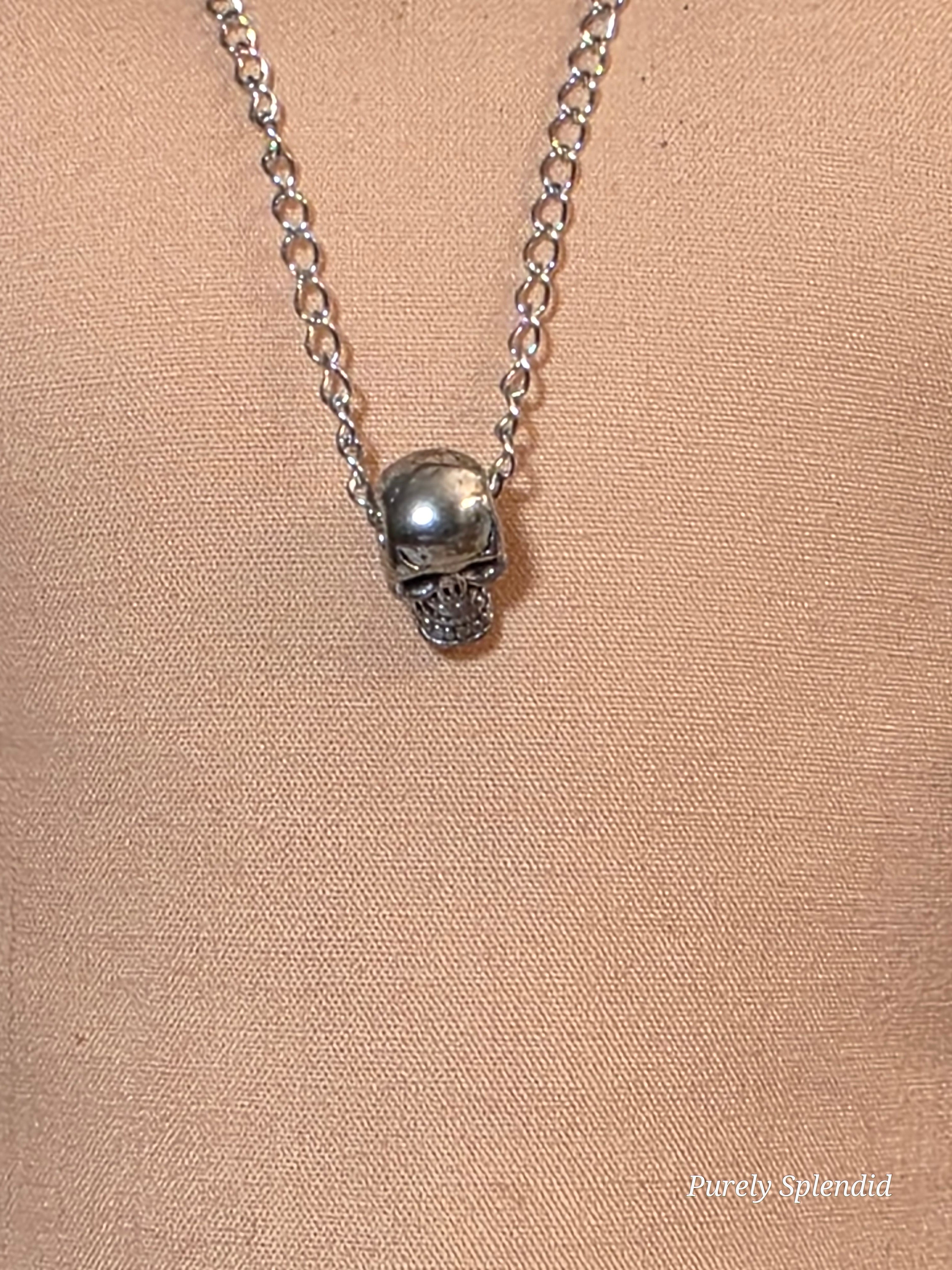 Close-up of silver skull pendant on chain necklace for 18 inch girl or boy doll, American made | Purely Splendid
