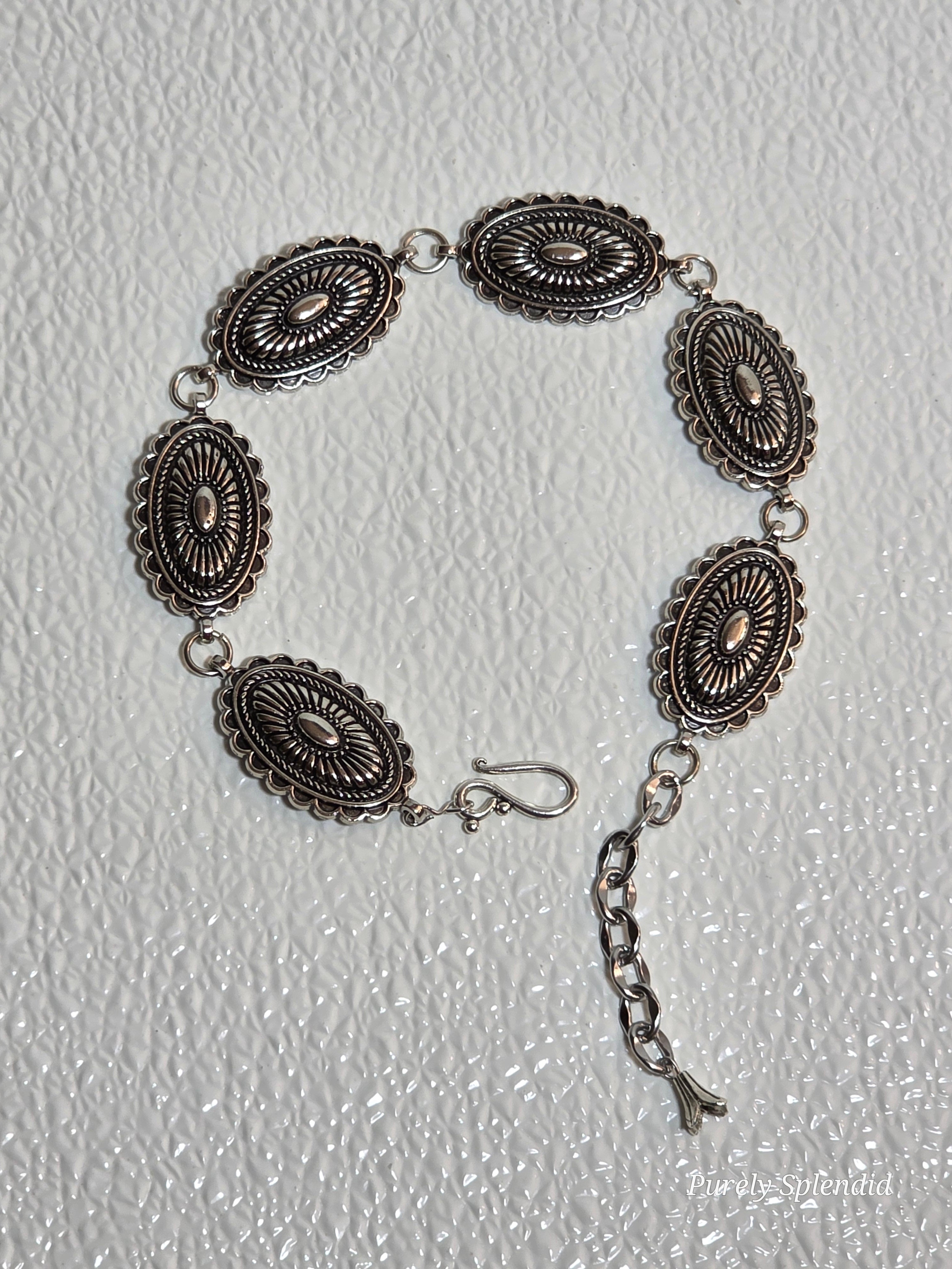Western Concho Belt detail view showing silver concho links and hook clasp for 18 inch girl doll, American made | Purely Splendid
