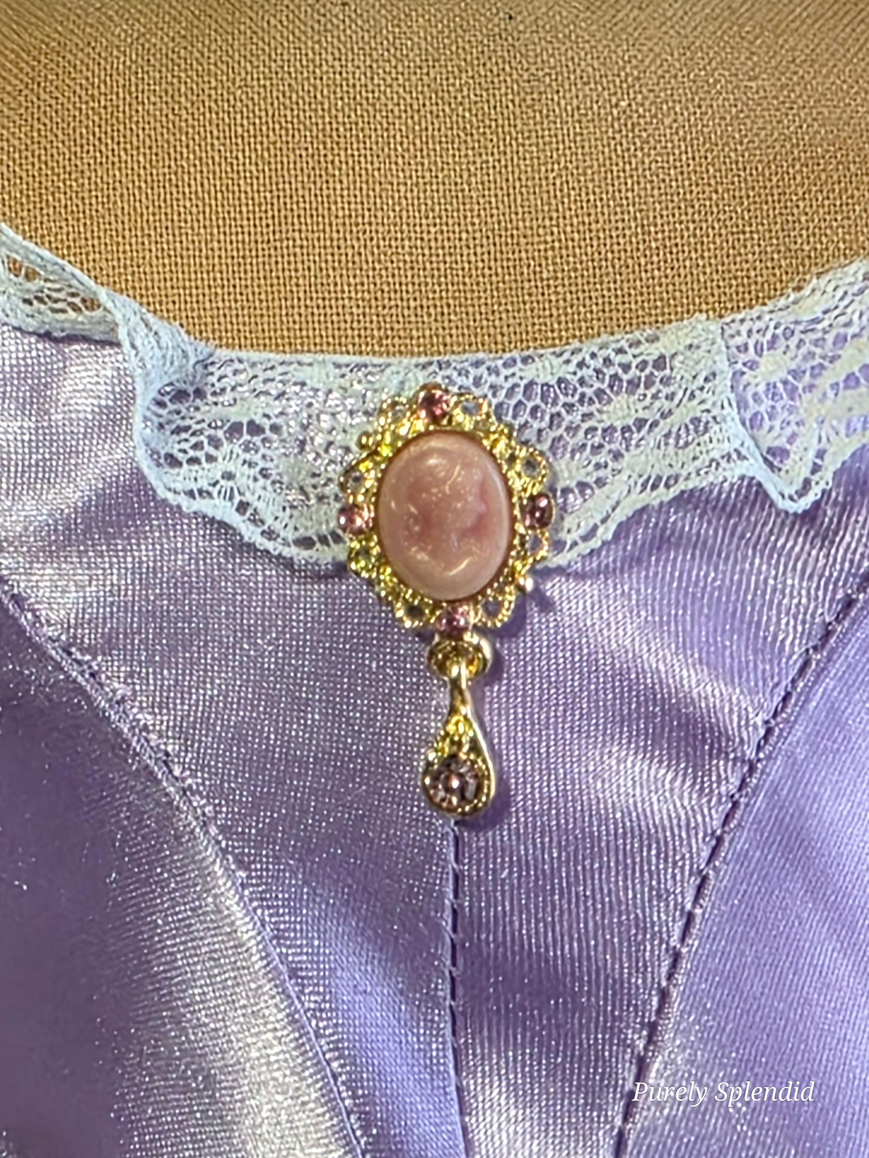 pink cameo with sparkling dangle worn by and 18 inch doll