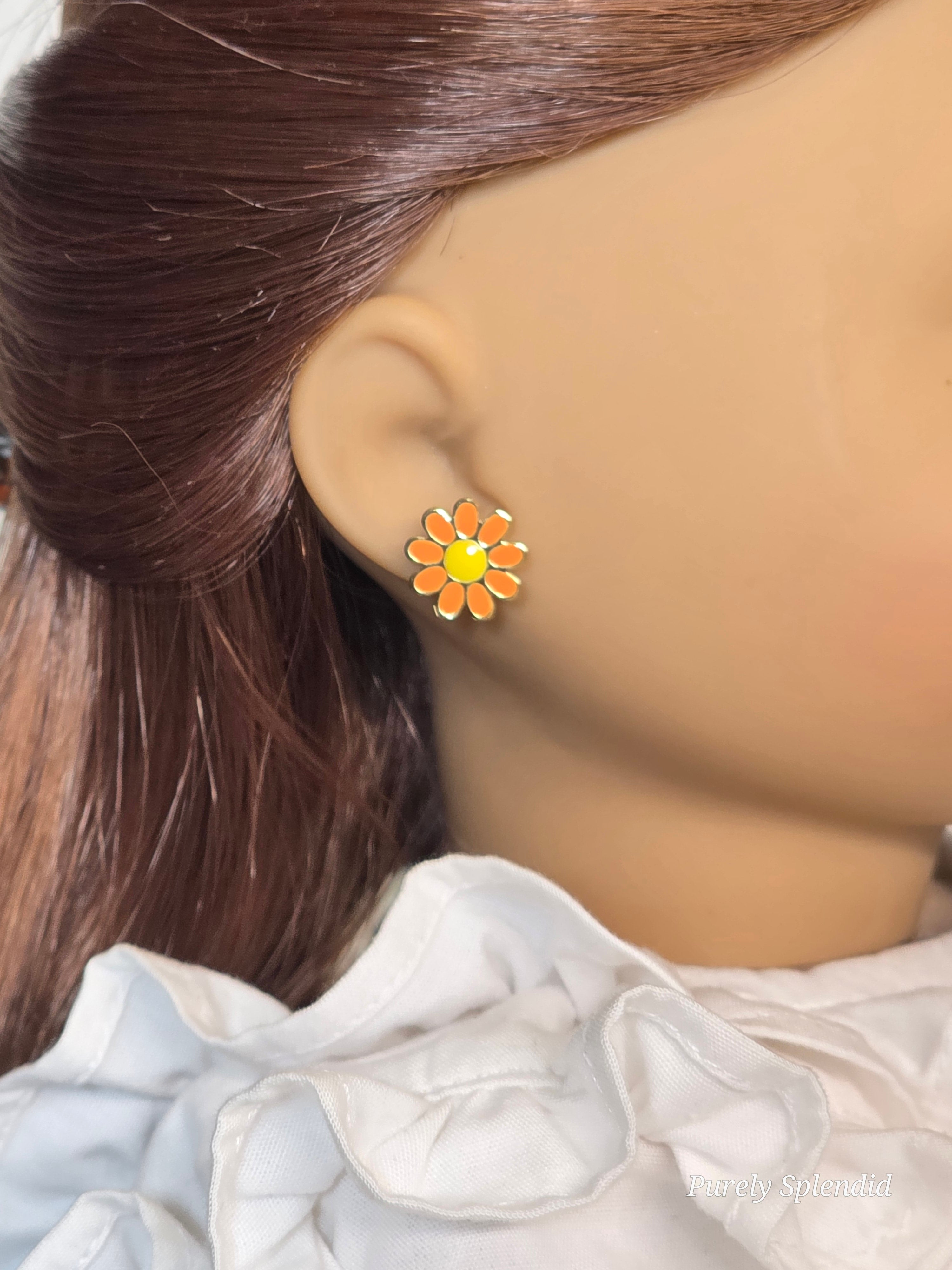 American made Orange Daisy 2mm Stud Earrings worn by an 18 inch doll / Purely Splendid