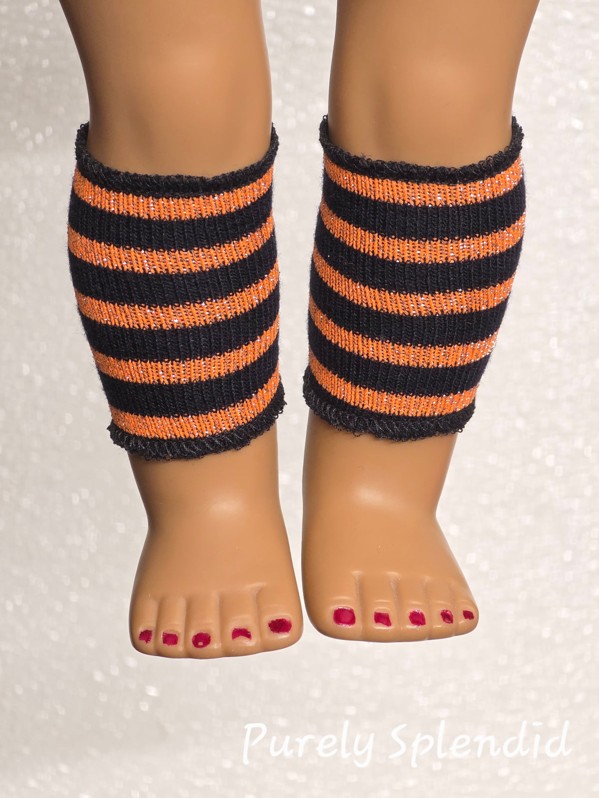 18 inch doll wearing a pair of Halloween armlets on her legs / American made / Purely Splendid