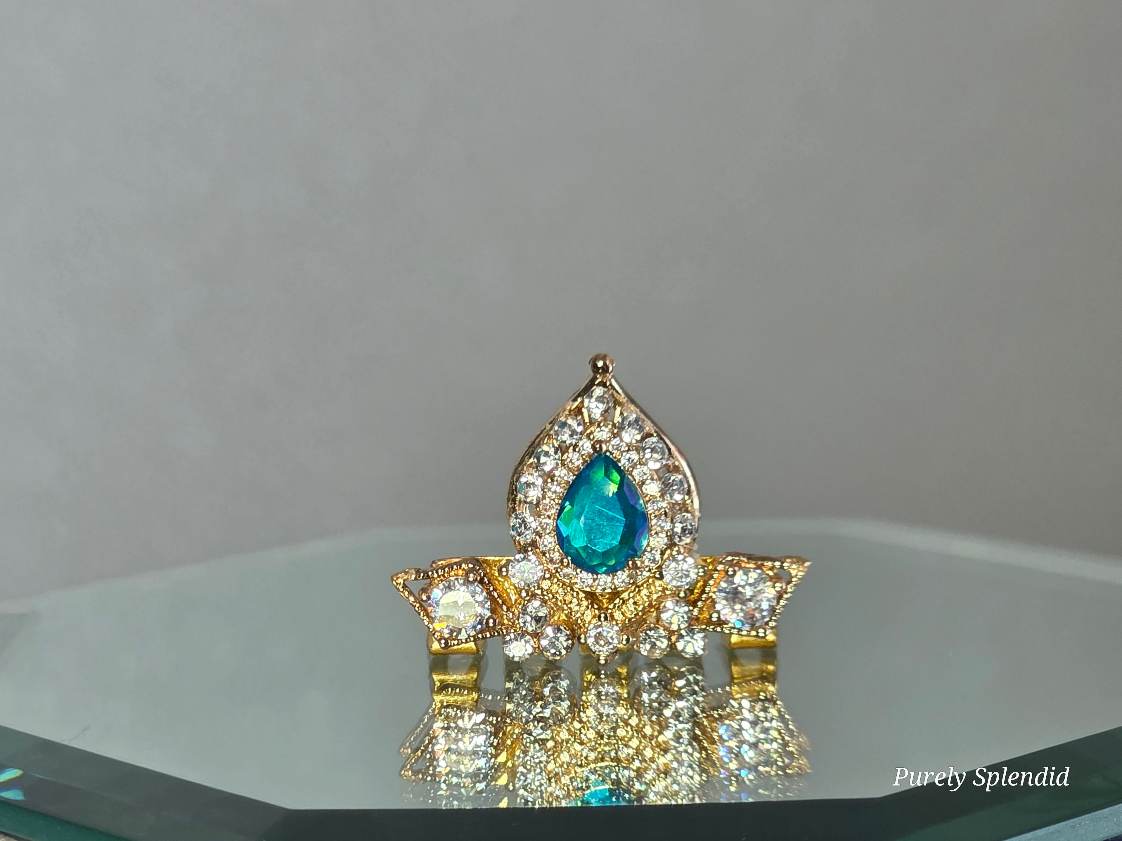 Gold doll crown with turquoise center gem - Jasmine tiara close-up detail